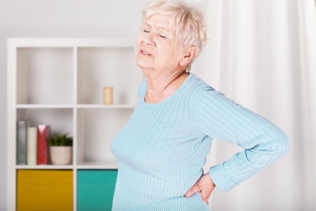 Back pain in a woman can be the cause of osteochondrosis